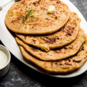 Whole Wheat Aloo Paratha With Curd