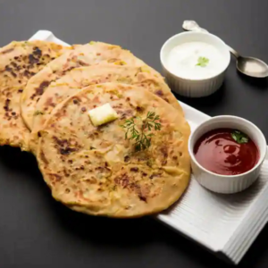 Whole Wheat Aloo Pyaj Paratha With Curd